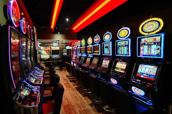 OKTA Login — Instantly access your secure account A confident dealer surrounded by casino chips inviting players to access their OKTA account, reflecting quick and easy login options.