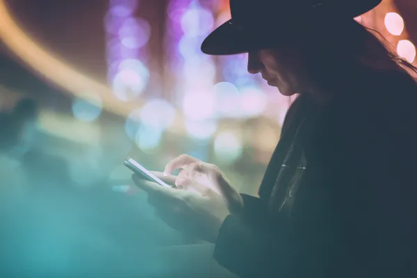 OKTA Login — Instantly access your secure account A confident dealer surrounded by casino chips inviting players to access their OKTA account, reflecting quick and easy login options.